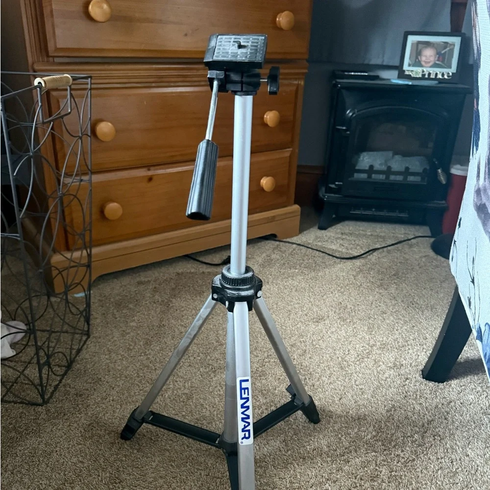 Silver and Black Tripod with Telescoping Legs and Quick-Release Locks